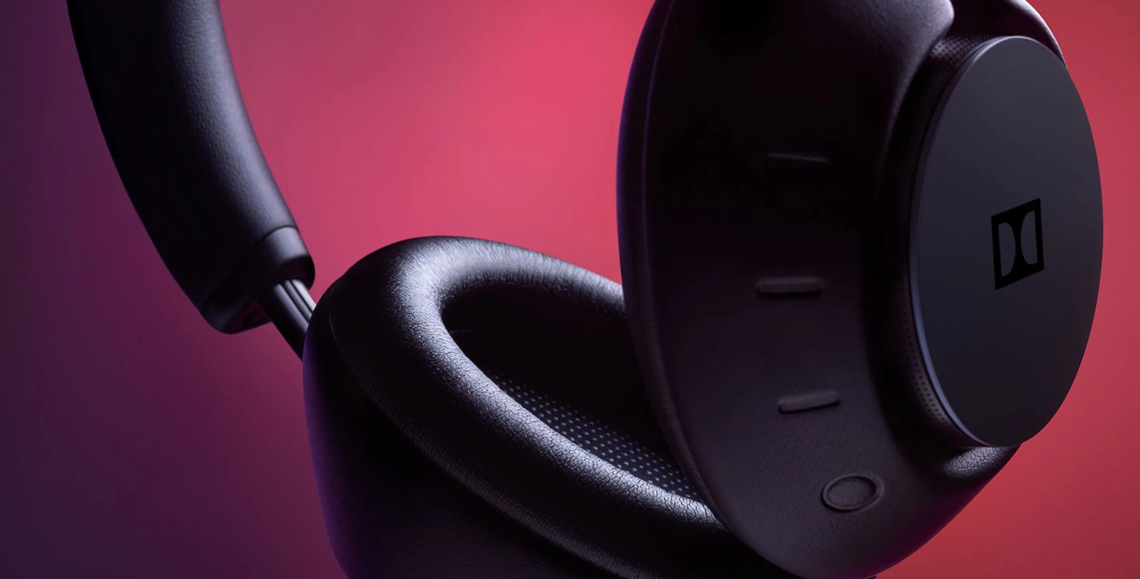 Dolby Dimension wireless headphones in sleek black finish showcasing premium design
